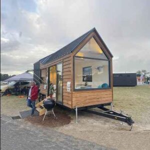 motorhome with steel structure, modern design, natural light, and scenic views through aluminum alloy awindows and solar-powered (1800 * 600 * 800)