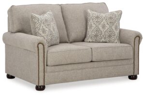 signature design by ashley gaelon transitional loveseat with nailheads and 2 accent pillows, beige