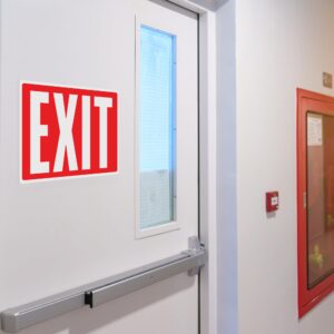 Exit Sign Stickers - Glow in The Dark - 4 pcs, 10" by 7" - Ideal Illuminated Emergency Exit Signs for Business or Office - Photoluminescent and UV Protected - Apply to Door, Wall, Window