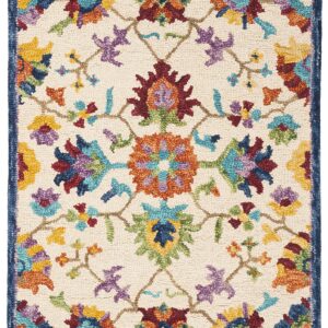 SAFAVIEH Aspen Collection Accent Rug - 2'3" x 5', Ivory & Blue, Handmade Boho Floral Wool, Ideal for High Traffic Areas in Entryway, Living Room, Bedroom (APN509A)