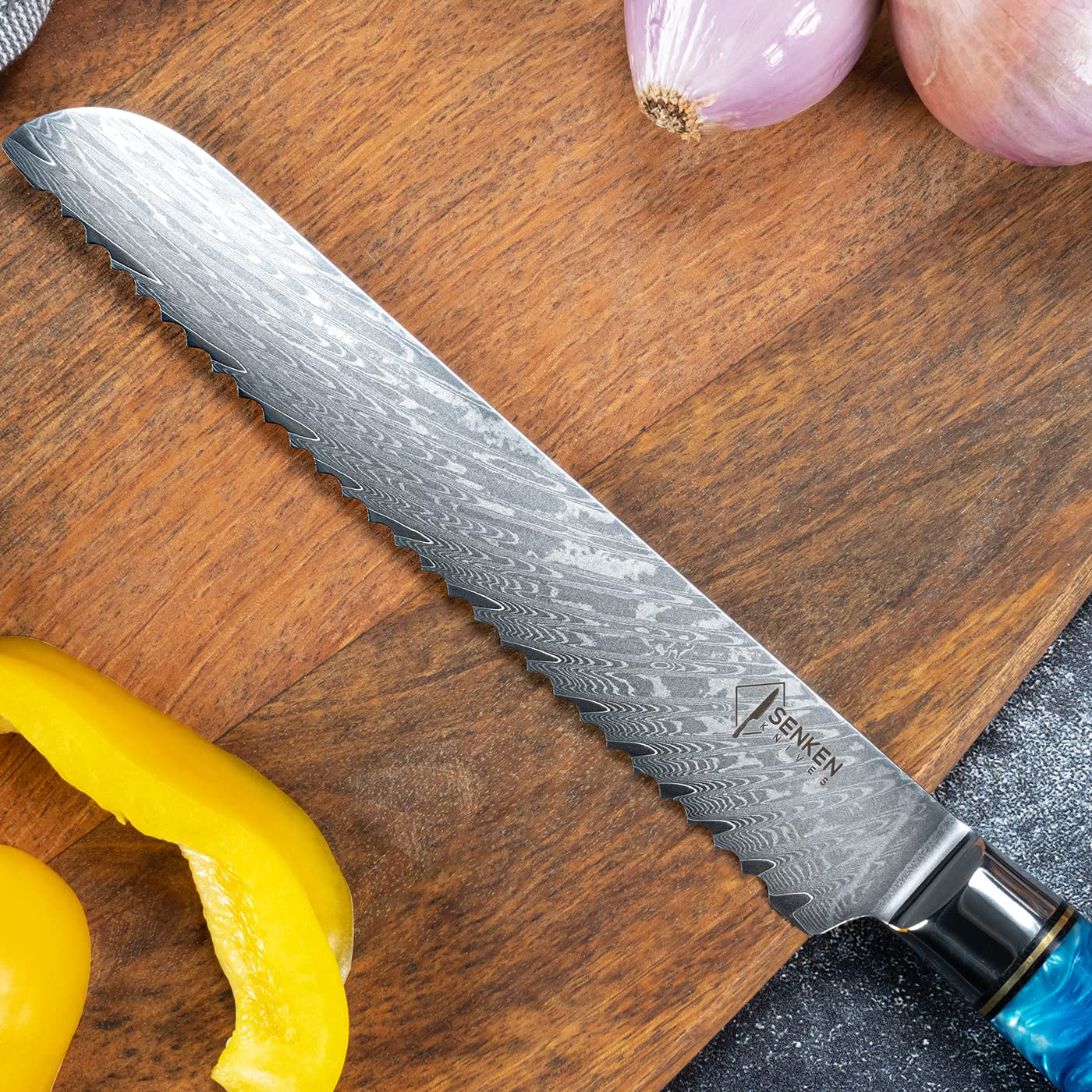 SENKEN Damascus Steel Bread Knife - Tsunami Collection - 67-Layer Japanese VG10 Steel Core - Unique Blue Resin & Natural Wood Handle, Razor Sharp, Beautiful Damascus Wave Pattern (7.5" Bread Knife)