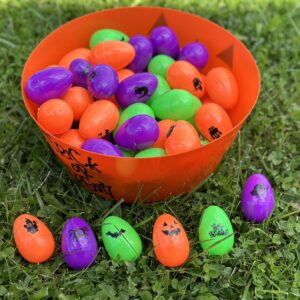 Iconikal 72-Count Halloween Eggs - Durable Plastic Holiday Treat Containers in Orange, Neon Green, and Purple Featuring 6 Different Fun Designs (2.3 x 1.6)