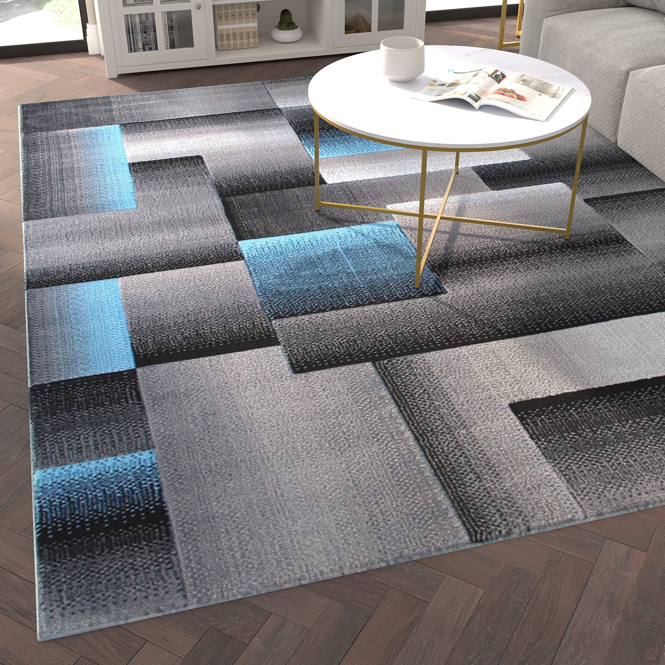 EMMA + OLIVER Malaga Olefin Accent Rug - Modern Cubist Pattern - Black and Gray Shades with Vibrant Blue Accents - 8x10 - Moisture & Stain Resistant