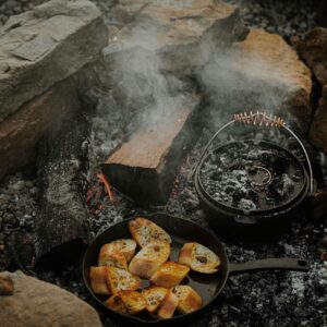 Barebones Polished Cast Iron Dutch Oven with Lid - 4-Quart Premium Performance Cookware with a Heat-Dispersing Copper Handle and Ring