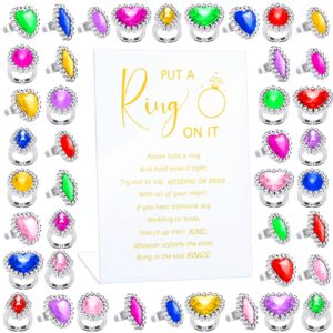 woanger put a ring on it game with 100 pcs fake rings, plastic rings for bridal shower game, acrylic sign for guests engagement wedding decoration