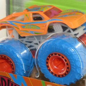 Hot Wheels 2022 Monster Trucks 1:64 Scale Diecast Glow in The Dark Podium Crasher, Orange with Blue Wheels