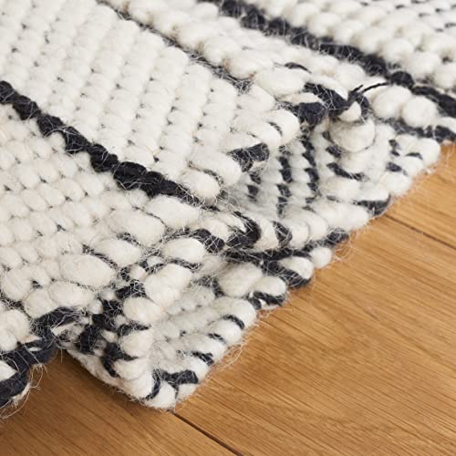 SAFAVIEH Natura Collection Accent Rug - 4' x 6', Black & Ivory, Handmade Flat Weave Boho Farmhouse Wool, Ideal for High Traffic Areas in Entryway, Living Room, Bedroom (NAT281Z)