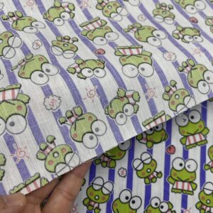 AMORNPHAN 44 Inch Green Keroro Happy Frog Cartoon Purple Stripes Printed On White Cotton Fabric Themed Pattern with Frogs for Craft Decorative Kid Patchwork Handmade Sewing Crafting for 1 Yard