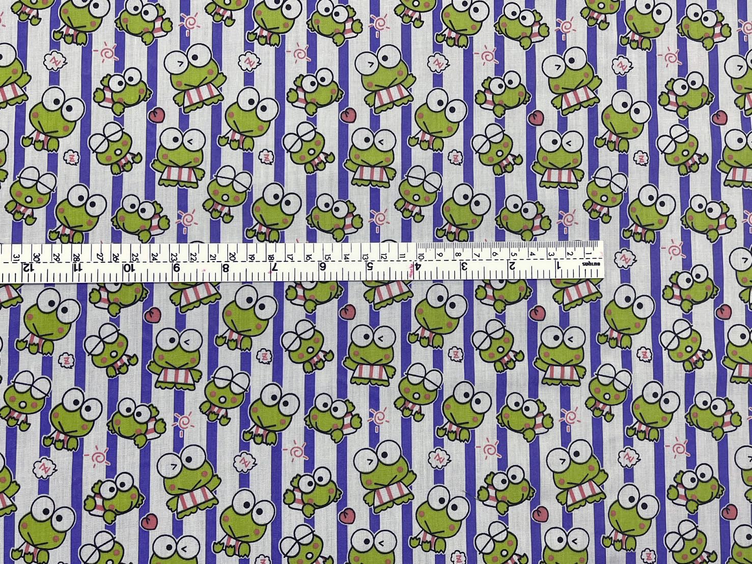 AMORNPHAN 44 Inch Green Keroro Happy Frog Cartoon Purple Stripes Printed On White Cotton Fabric Themed Pattern with Frogs for Craft Decorative Kid Patchwork Handmade Sewing Crafting for 1 Yard