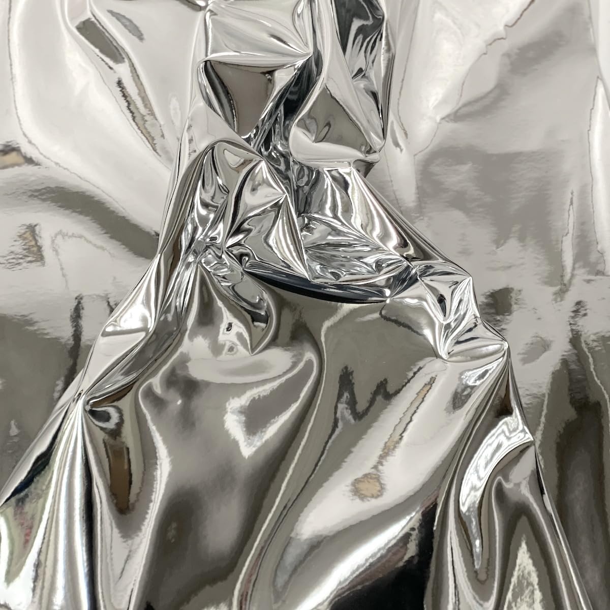 Fashion Fabrics LLC Silver Chrome Reflective Mirror Vinyl Upholstery Crafting Fabric - Sold by The Yard - 54"