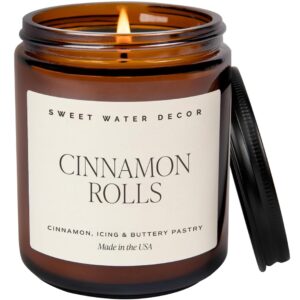 sweet water decor cinnamon roll candle - christmas candle with cinnamon, icing & buttery pastry for home - cinnamon soy candle with 40 hours burn time - 9oz black lid amber jar cinnamon scents