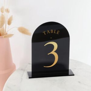 UNIQOOO Black Arch Wedding Table Numbers with Stands 1-20, Gold Foil Printed 5x7 Double Sided Acrylic Signs and Holders, Perfect for Centerpiece, Reception, Decoration, Party, Anniversary, Event