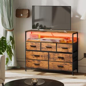 NASHZEN Dresser TV Stand, 7 Drawer Bedroom Dresser with Power Outlets & LED Lights, Wide Fabric Dresser with Open Shelf, for TV Up to 45’’, Caramel Brown