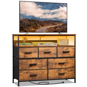 nashzen dresser tv stand, 7 drawer bedroom dresser with power outlets & led lights, wide fabric dresser with open shelf, for tv up to 45’’, caramel brown