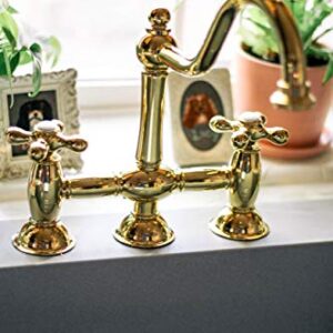 Kingston Brass KS3792AXBS Restoration Bridge Kitchen Faucet, 9", Polished Brass