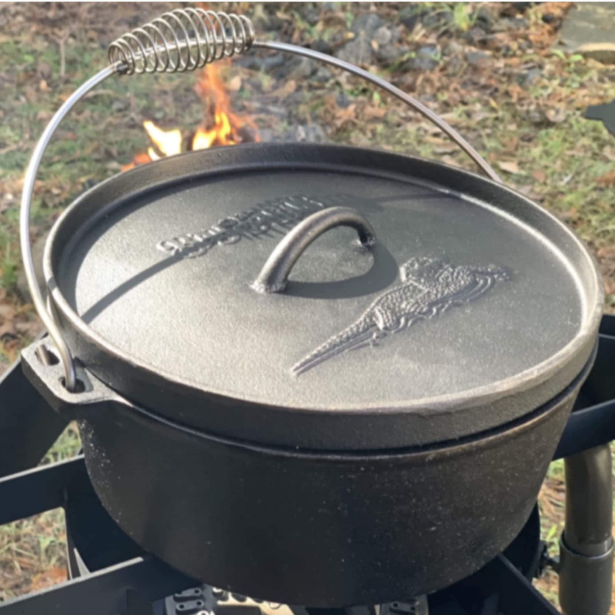 Bayou Classic 7402 2-qt Cast Iron Dutch Oven Features Flanged Camp Lid Stainless Coil Wire Handle Grip Perfect To Use Over A Campfire To Prepare One-Pot Meals Bake Cornbread Biscuits or Cobbler