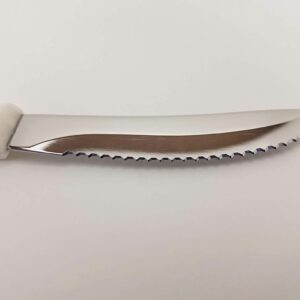 CUTCO Model 1759 Table Knife with White (Pearl) handle....................3.4” High Carbon Stainless DD serrated blade.............in factory sealed plastic bag.