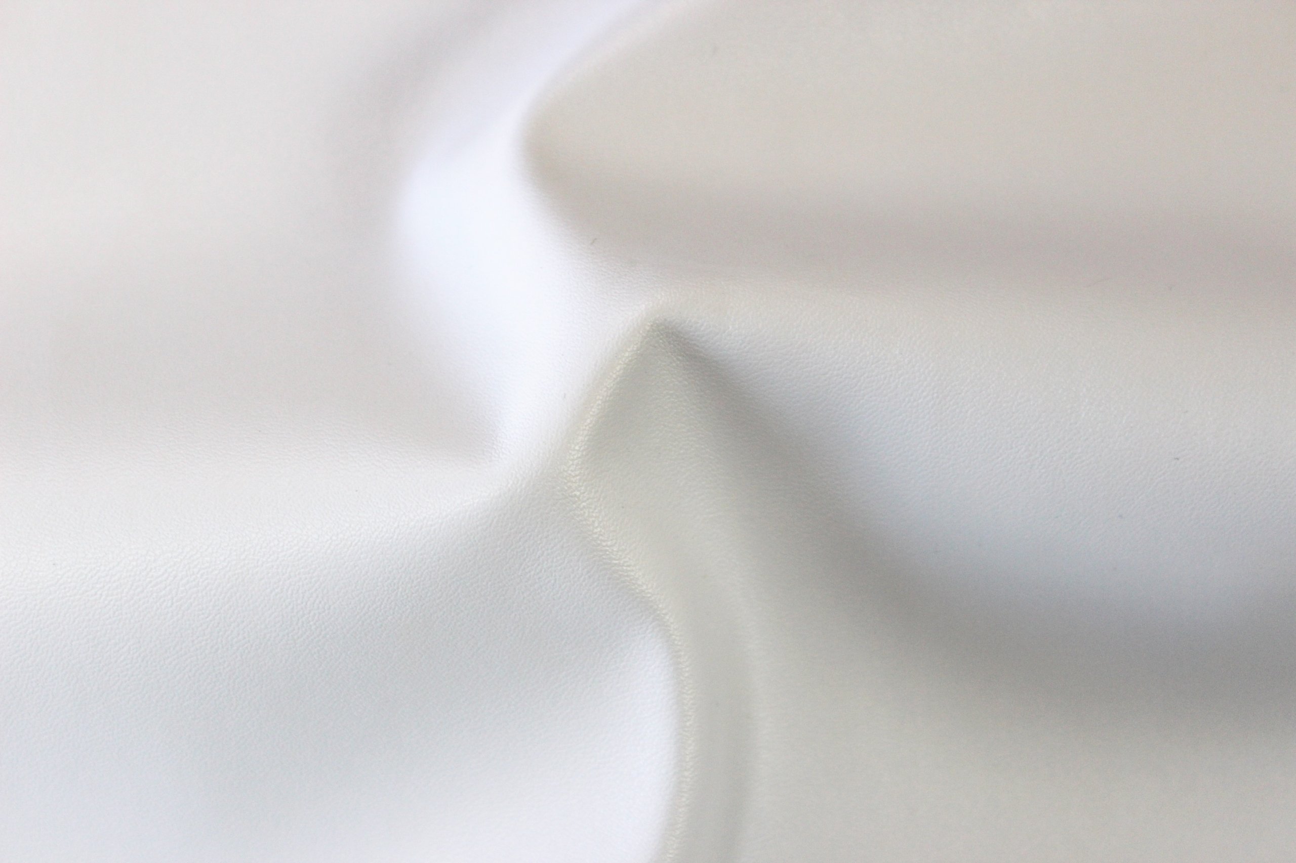 2-Way Stretch White Faux Leather Fabric by The Yard