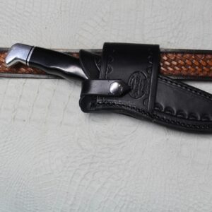 Buck 119 Cross Draw Knife Sheath. This Sheath Is Made Out of 8 Ounce Leather the Leather Is Very Soft Durable and Pliable You Will Not Need to Line Your Sheath for Your Finer Knives. The Leather Is Dyed Black with Border Tooling. The Sheath Can Be Worn on