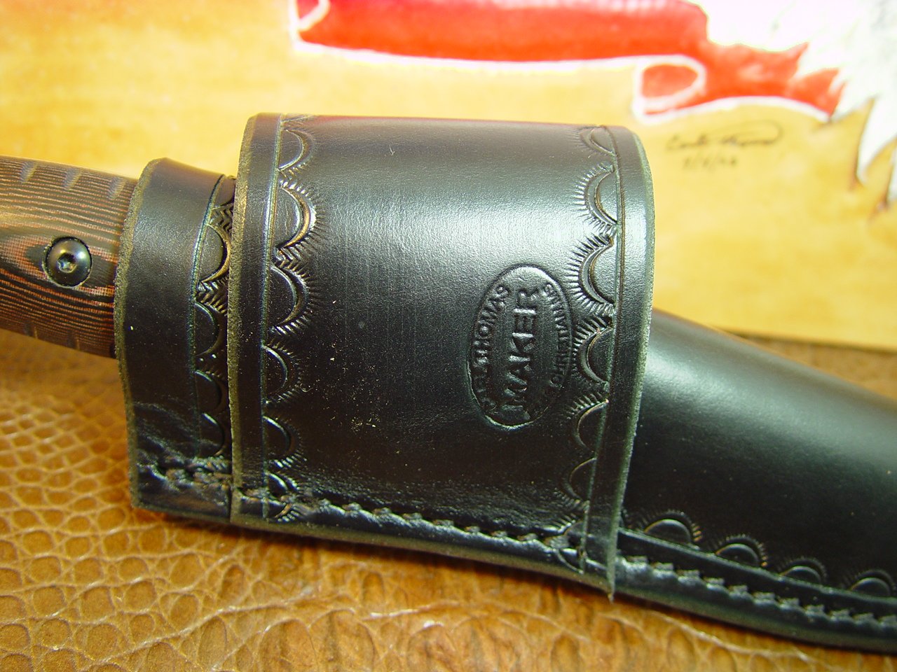 Custom cross draw knife sheath for the buck Selkirk knife. The sheath is made out of water buffalo hide leather Black.