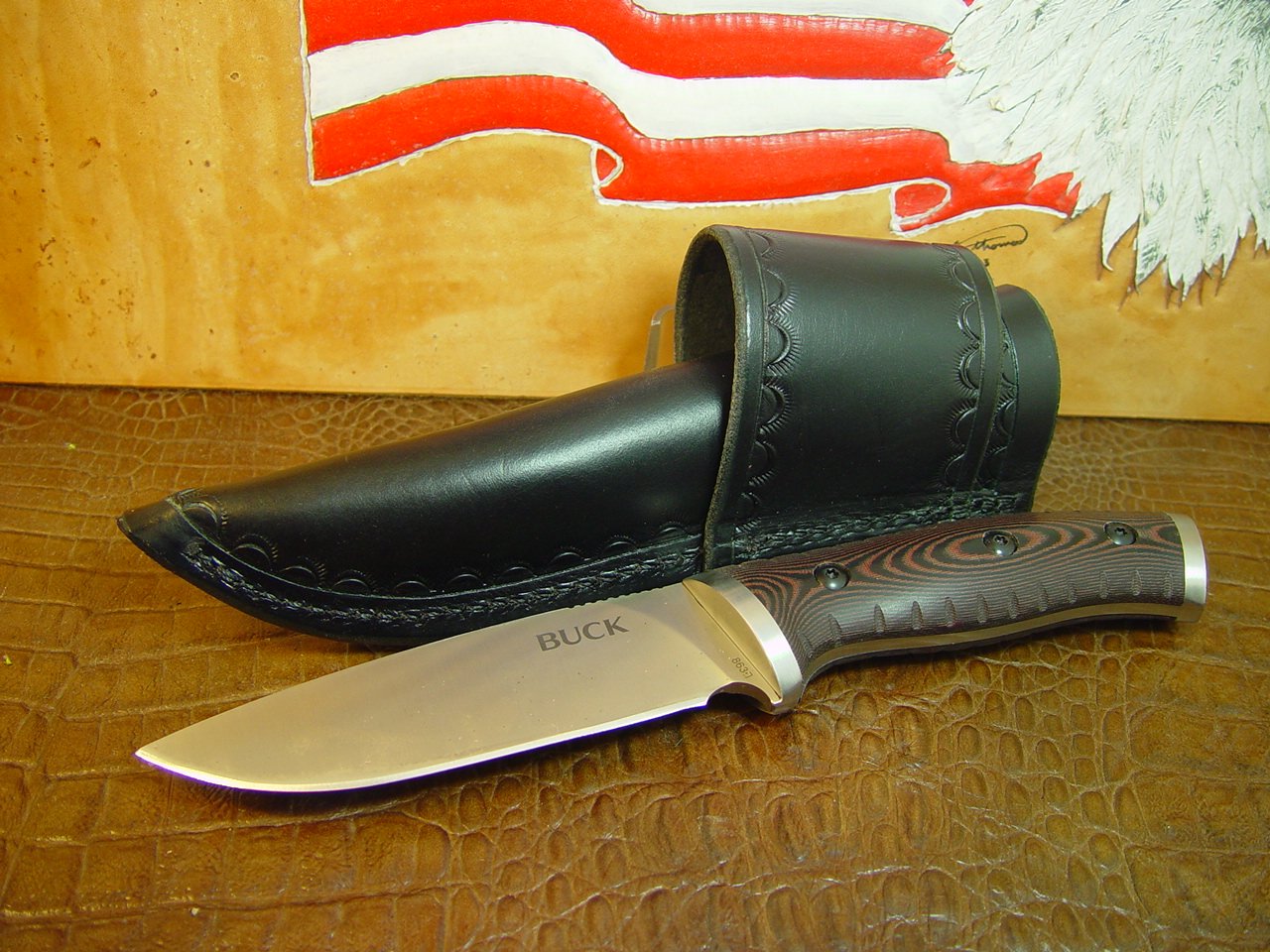 Custom cross draw knife sheath for the buck Selkirk knife. The sheath is made out of water buffalo hide leather Black.