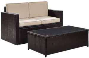 crosley furniture palm harbor 2-piece wicker outdoor coffee table and loveseat patio furniture set for porch, brown with sand cushions